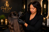 a woman getting her hair done in a salon